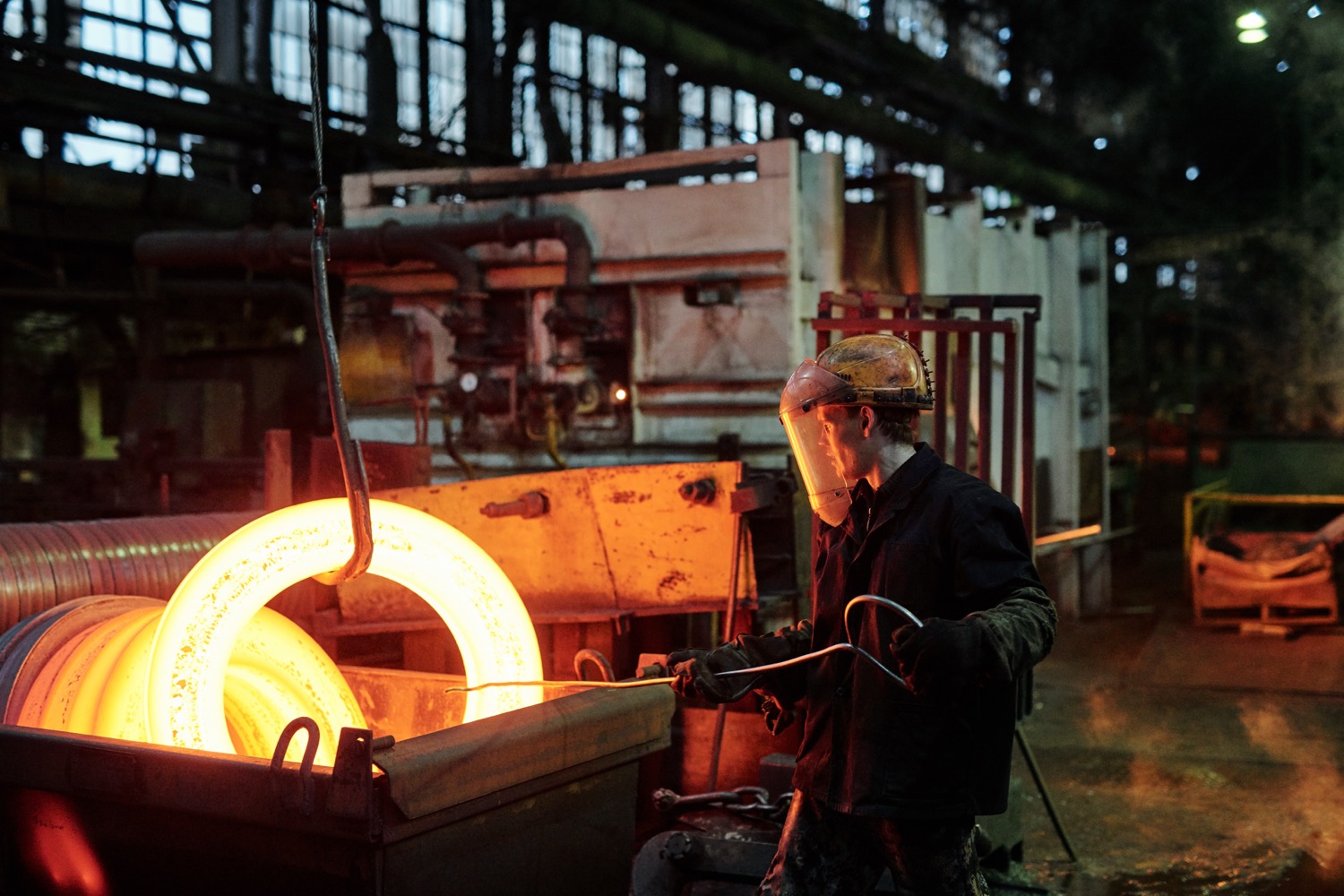 worker melting metal